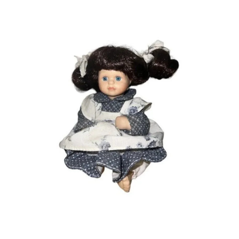 Vintage Small Porcelain Seated Doll Pigtails Apron Dress Blue Eyes